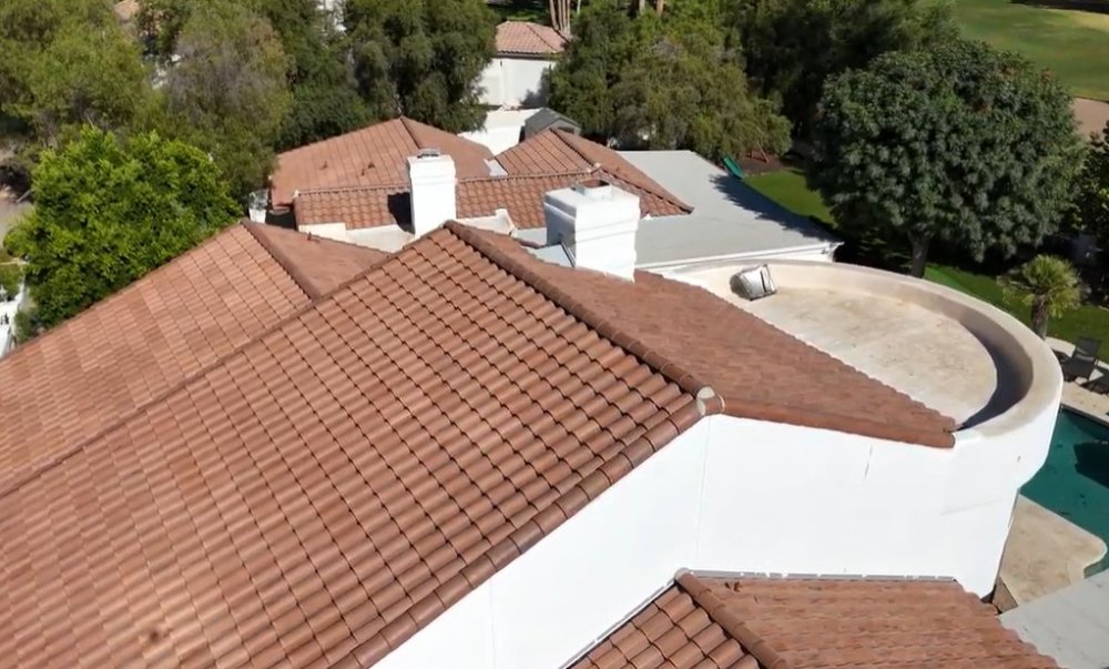 Close-up of concrete tile roof replaced by Johnson Roofing